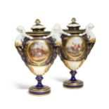 A pair of Sevres style gilt metal mounted two-handled vases and covers, circa 1860,