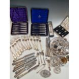 A collection of assorted silver, including two sets of six pistol handled tea knives, 12 dessert