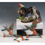 A graduated set of three Beswick flying ducks, a Beswick Green Woodpecker, a Beswick Osprey spirit