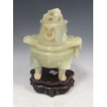 Jade censer on tri-form legs with chilong incised into the lid, 25cm tall with stand; together