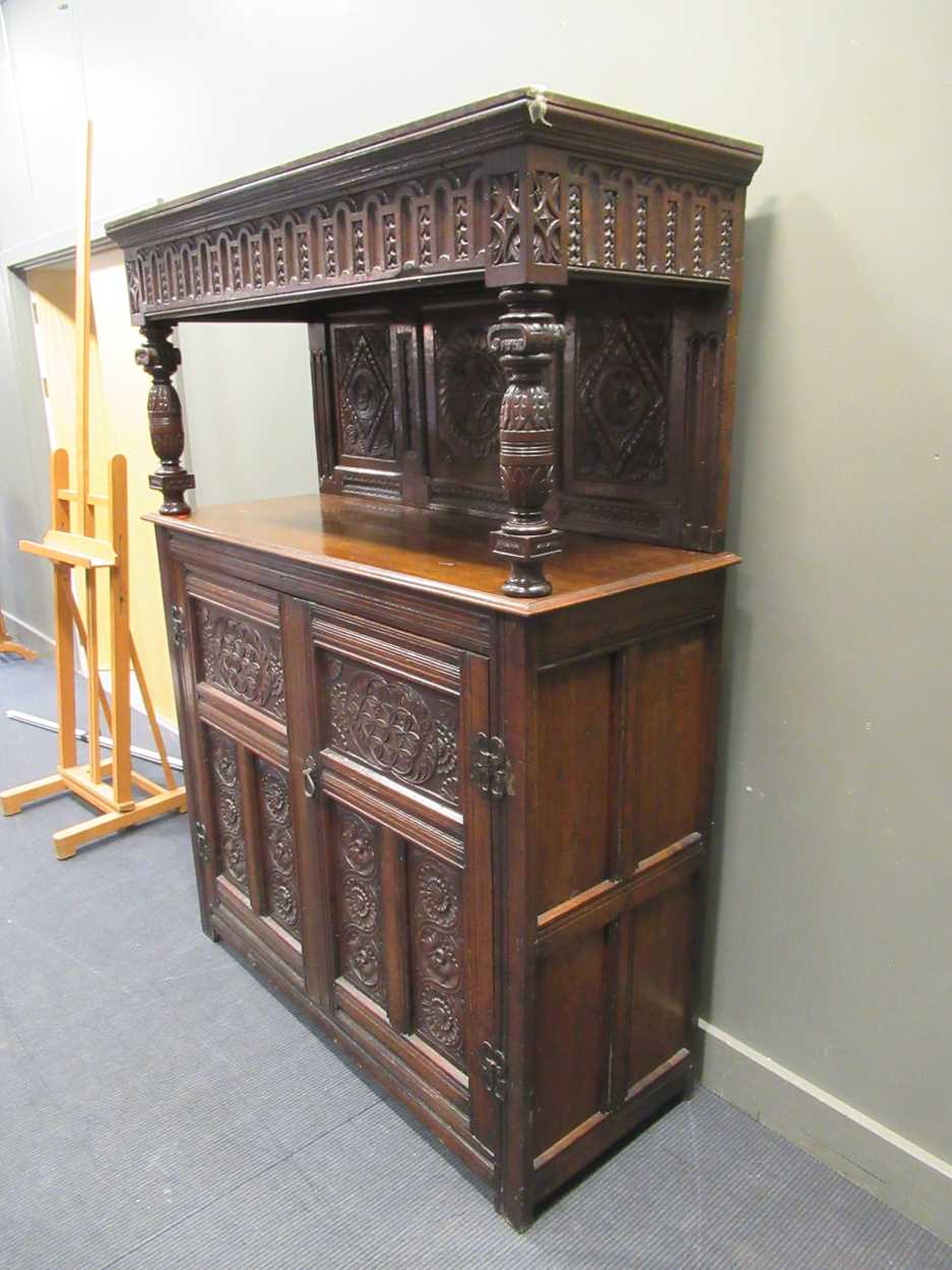 A carved oak court cupboard, 19th century, 189 x 140 x 56cmProperty from Blomvyle Hall - Image 6 of 6