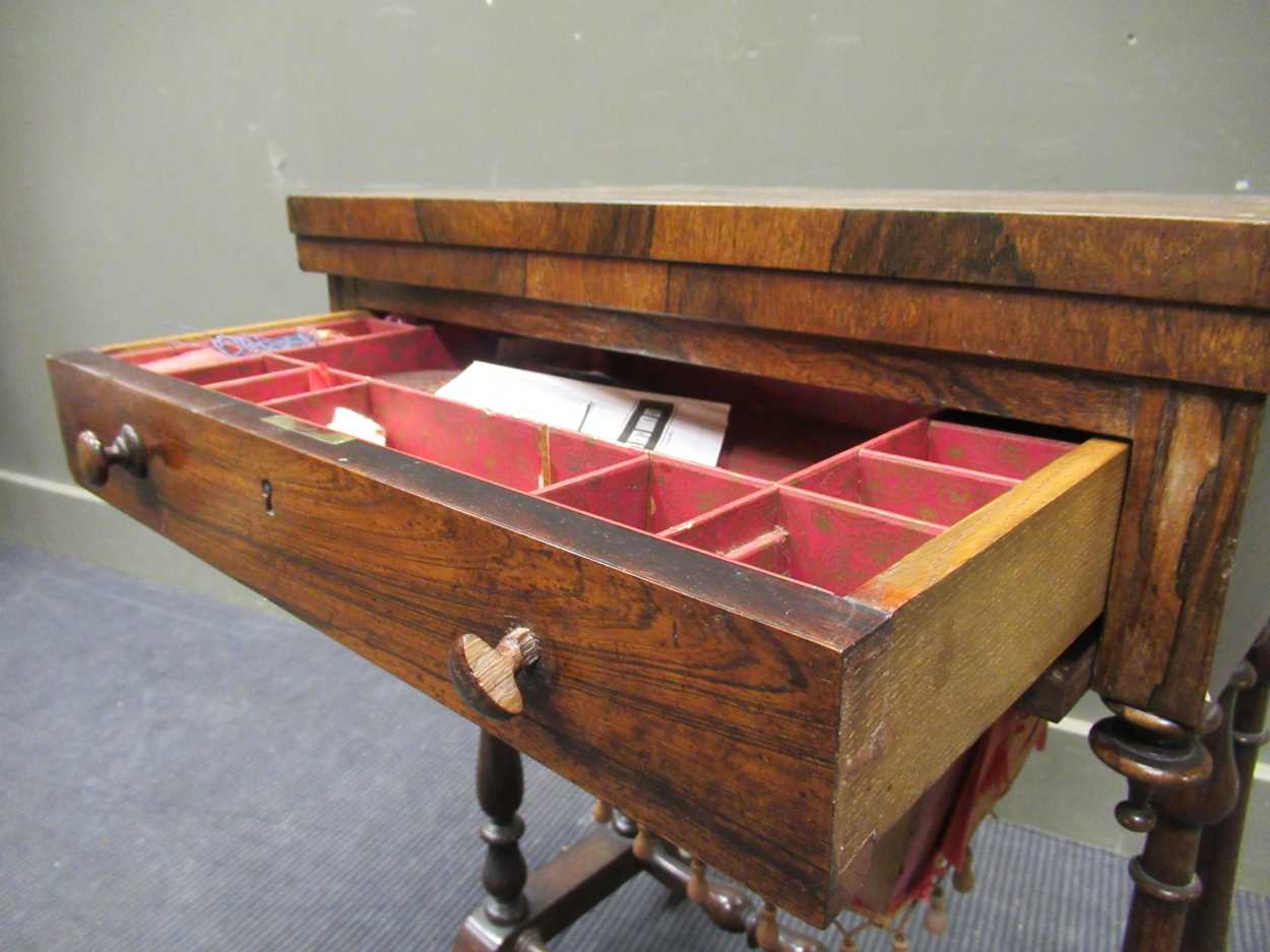 A 19th century inlaid rosewood games table, the fold over swivel top enclosing an inlaid - Image 10 of 10