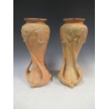 A pair of Continental Art Nouveau terracotta vases 33cm (2)