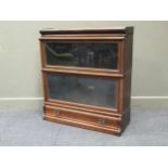 A Globe Wernick sectional bookcase, comprising of two glazed sections on a single drawer base, 95