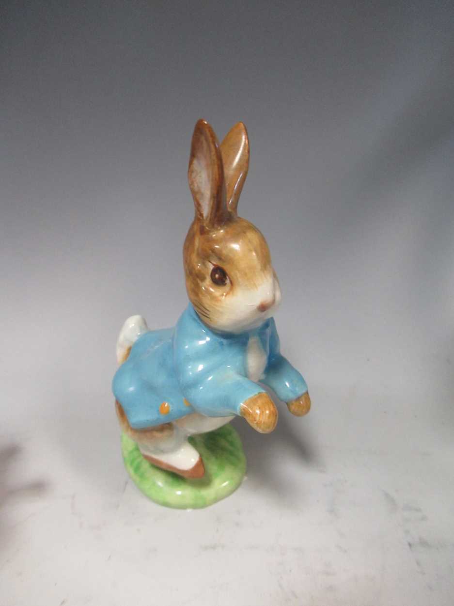 A collection of ceramic figures, to include a Beswick figure of Peter Rabbit, various Sitzendorf - Image 3 of 5