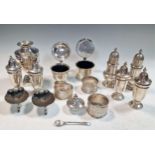A collection of silverware including napkin rings and cruets, 23ozt weighable silver