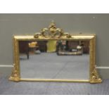 A Victorian rectangular giltwood overmantel mirror, the rectangular plate within a moulded frame