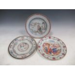 Three 18th/19th century plates, one with a bianco sopra bianco border enclosing a landscape scene,