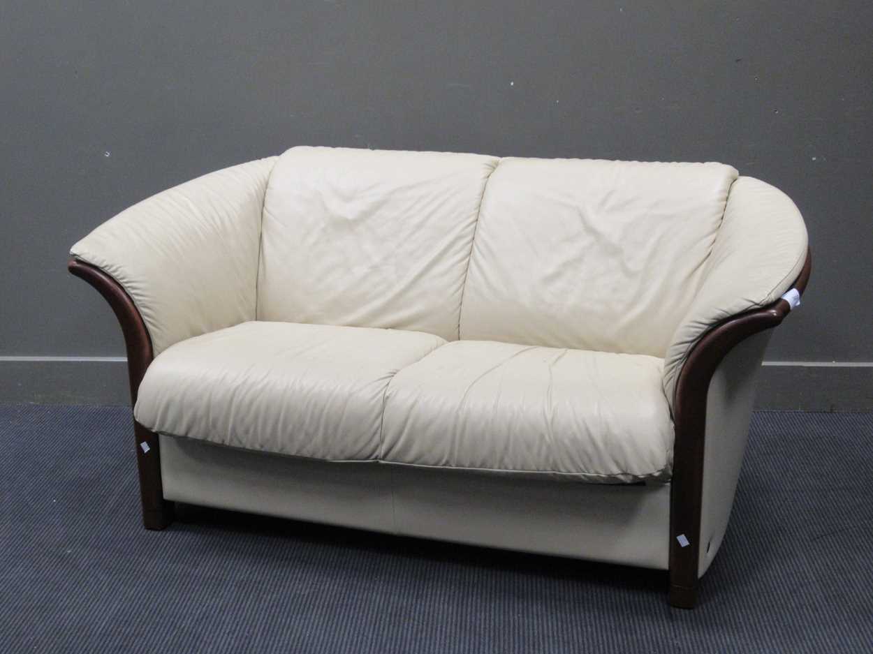 An Ekornes collection modern leather two seat sofa, 78 x 163 x 73cm