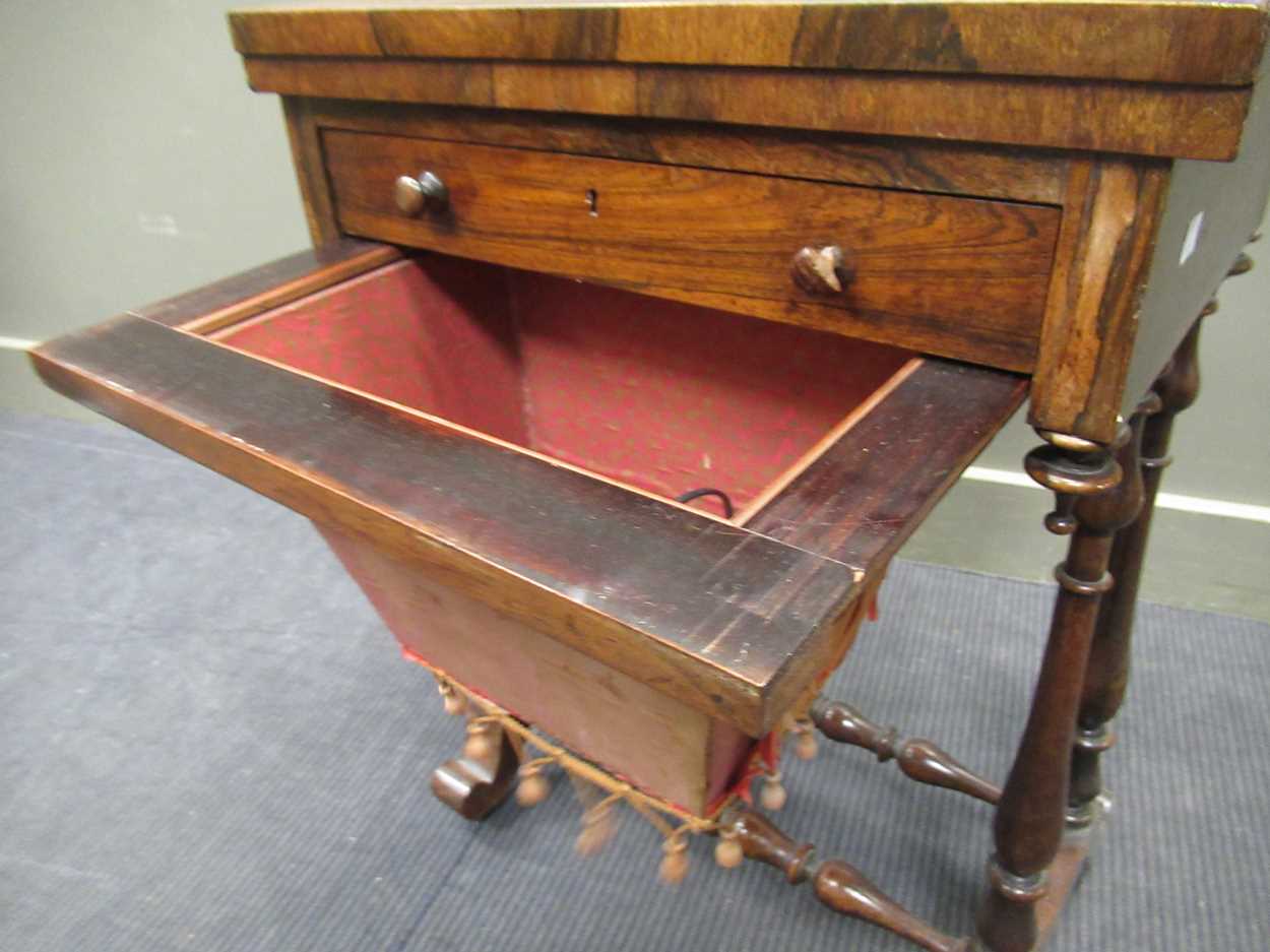 A 19th century inlaid rosewood games table, the fold over swivel top enclosing an inlaid - Image 9 of 10