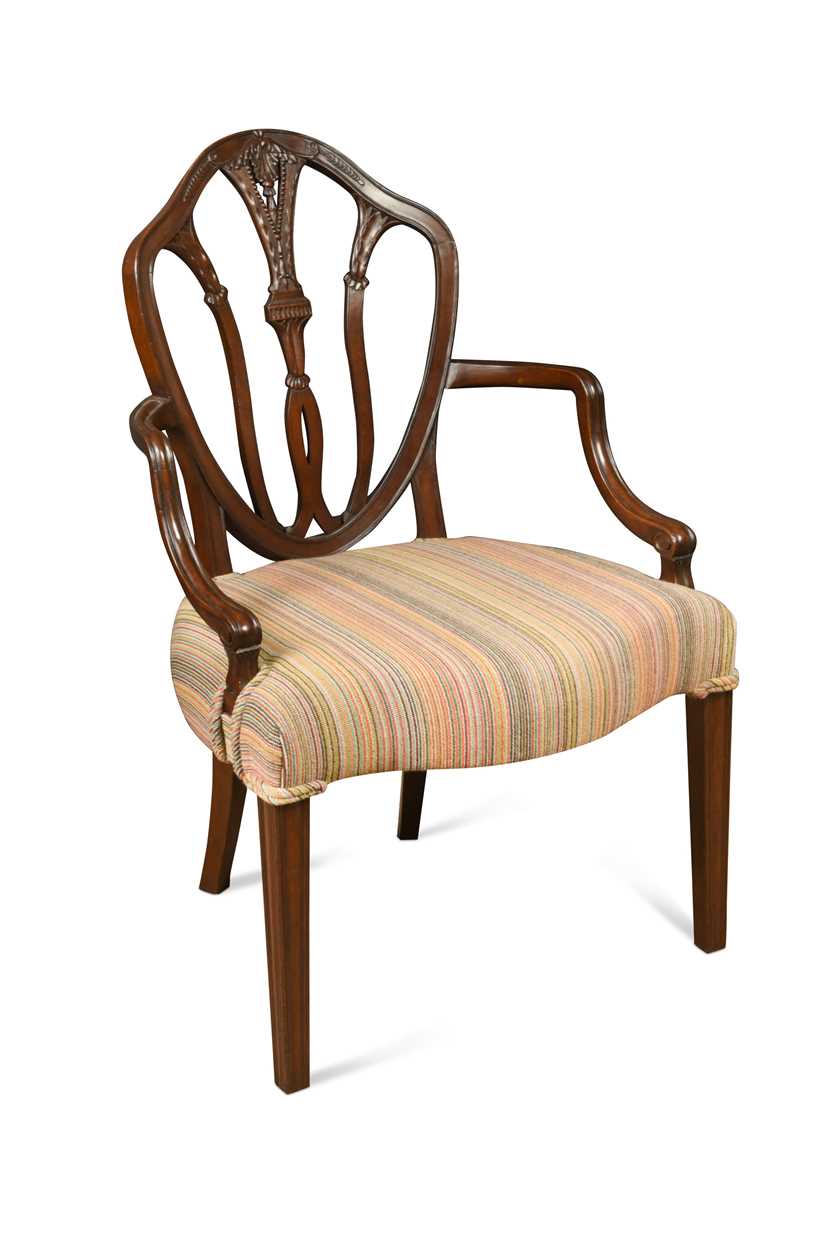 A late 19th century Hepplewhite style mahogany elbow chair with shield shaped back