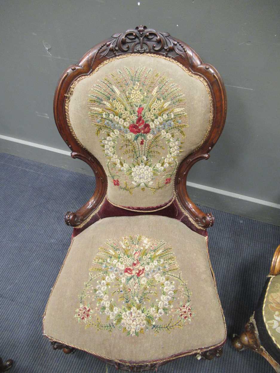 Two similar Victorian carved walnut spoon back chairs on cabriole front legs and ceramic castors and - Image 4 of 5