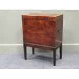 An early 19th century mahogany and box wood strung cellarette, the rectangular hinged top