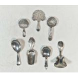 A collection of 7 caddy spoons