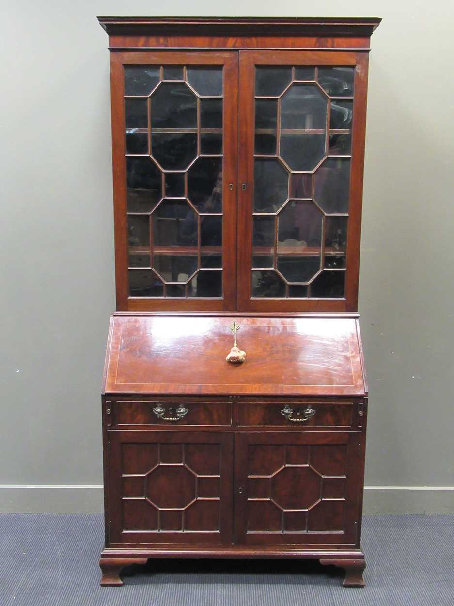 An early 19th century mahogany bureau bookcase, 232 x 113 x 62cm