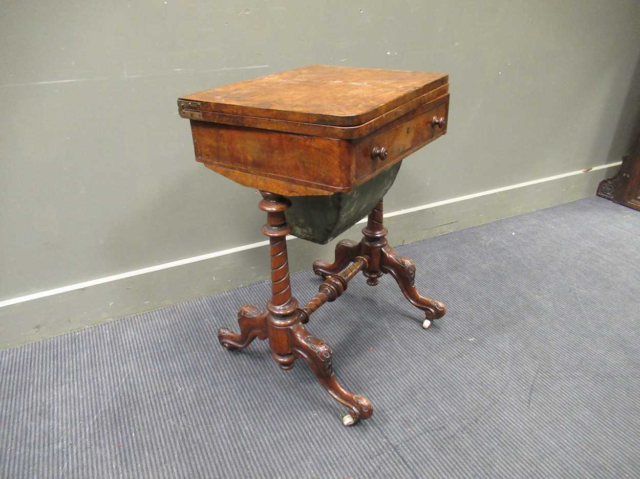 A Victorian walnut inlaid fold over games table, the fold over top enclosing an inlaid backgammon - Image 3 of 7