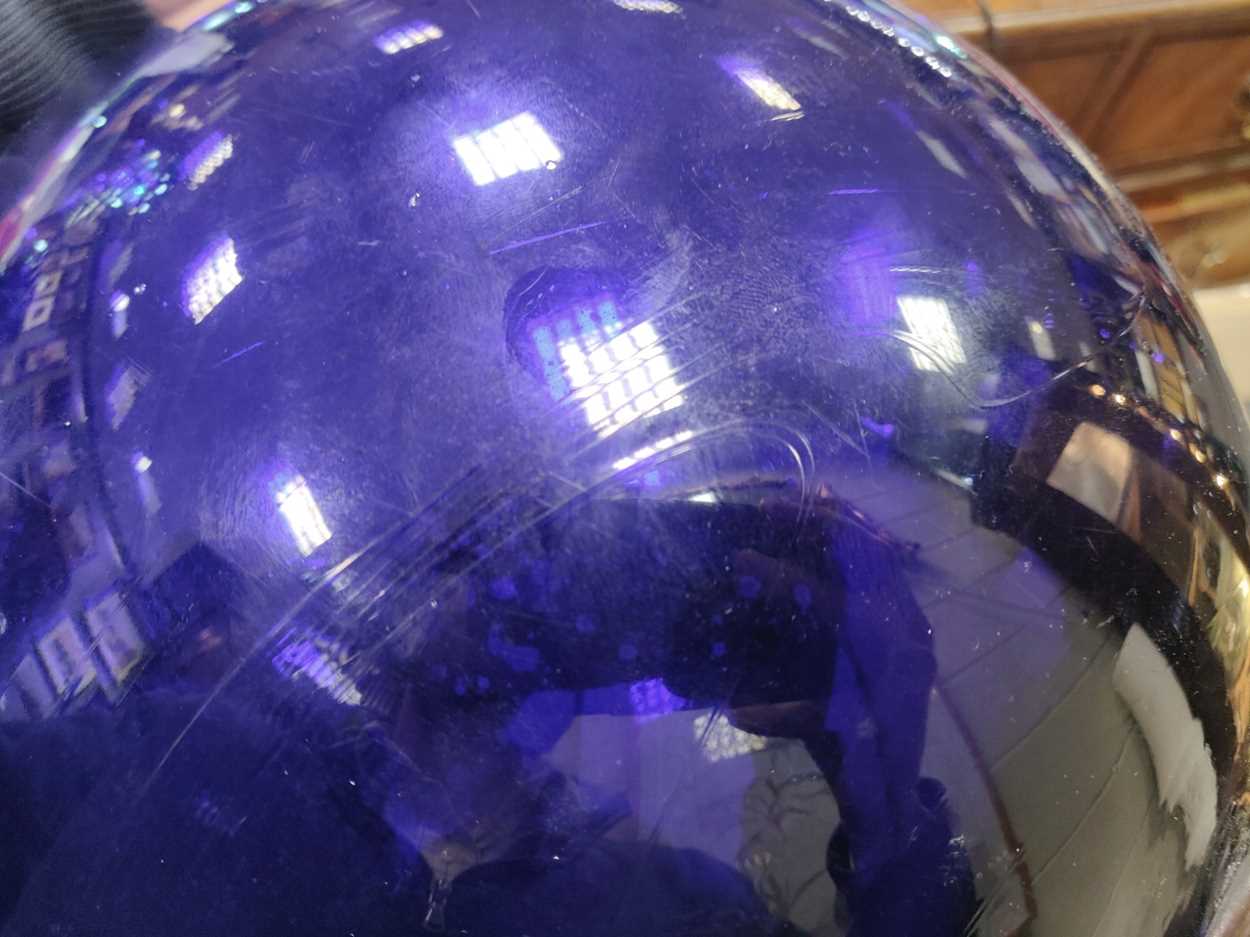 A large late 19th or early 20th century blue glass Witch's ball, approx 30cm diameterSome movement - Image 9 of 10
