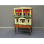 Late 19th century dolls house together with various miniature furniture, dolls, and accessories,