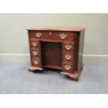 A George III style mahogany kneehole desk, 20th century, 76 x 87 x 51cm