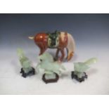 Three jade figures of two magpies and a leaping horse 15.5 cm high; together with a tang style