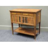 A French kingwood and mahogany side cabinet,