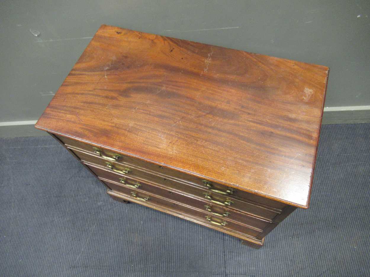 A Georgian style mahogany cabinet, with two fall front cupboard doors hidden by a four faux-drawer - Image 3 of 3