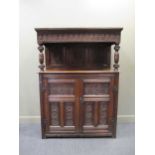 A carved oak court cupboard, 19th century, 189 x 140 x 56cmProperty from Blomvyle Hall