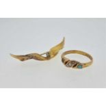 A diamond set wing brooch, stamped '15CT' and a split and turquoise ring hallmarked 15ct gold, gross