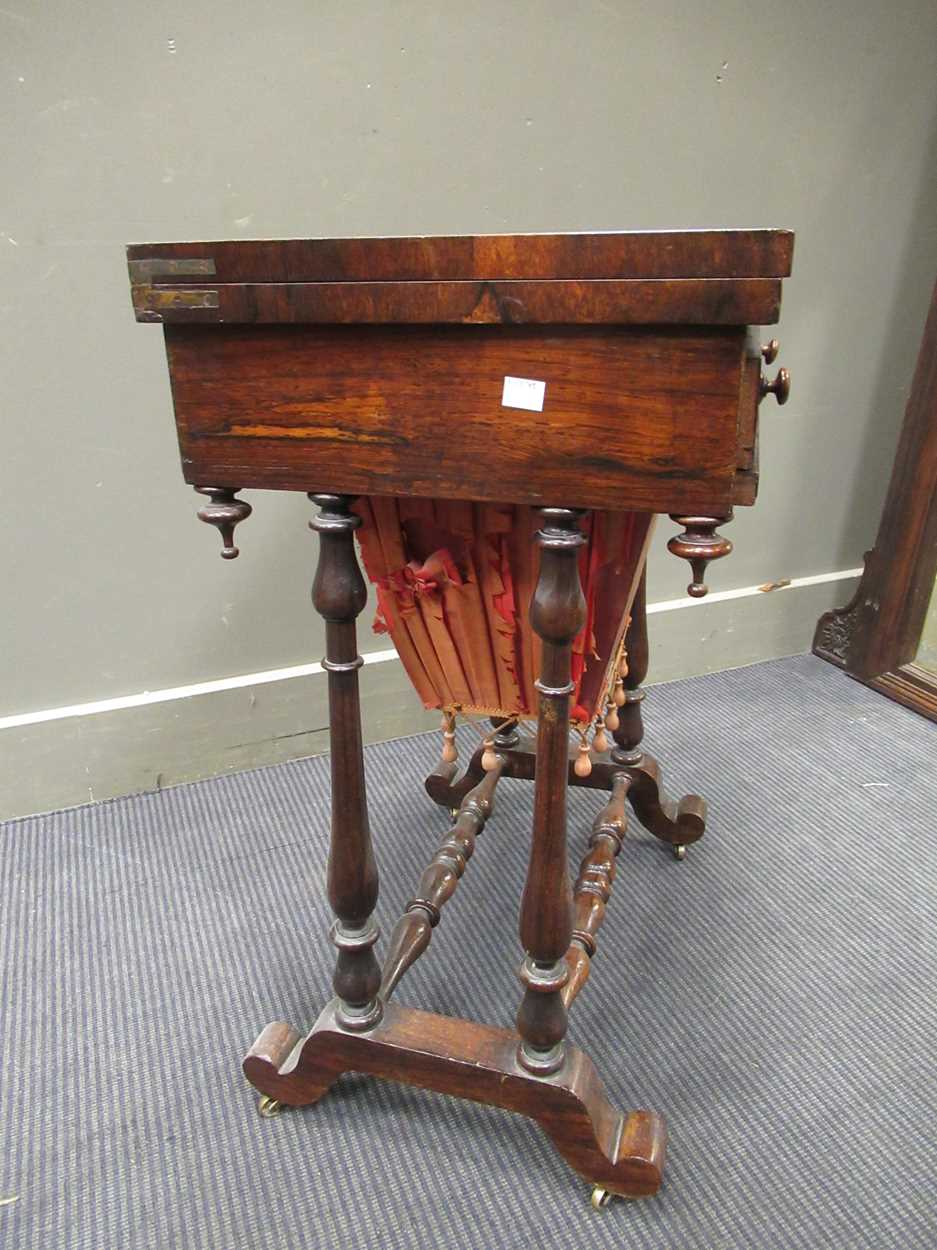 A 19th century inlaid rosewood games table, the fold over swivel top enclosing an inlaid - Image 7 of 10