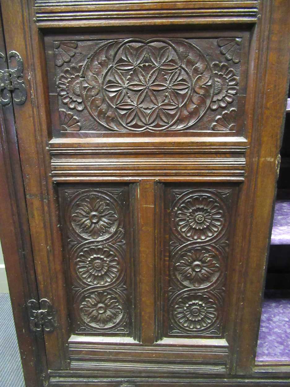 A carved oak court cupboard, 19th century, 189 x 140 x 56cmProperty from Blomvyle Hall - Image 3 of 6