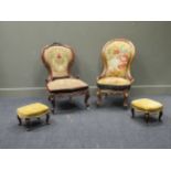 Two similar Victorian carved walnut spoon back chairs on cabriole front legs and ceramic castors and