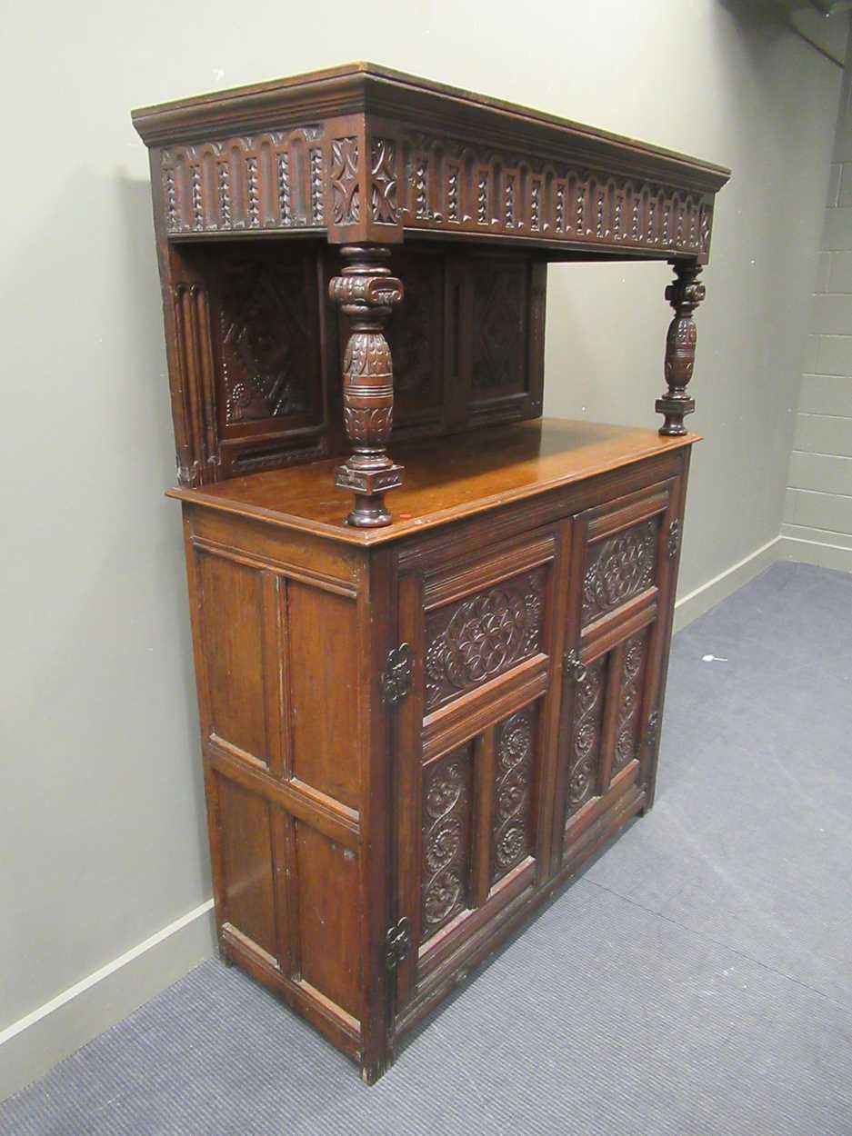A carved oak court cupboard, 19th century, 189 x 140 x 56cmProperty from Blomvyle Hall - Image 2 of 6