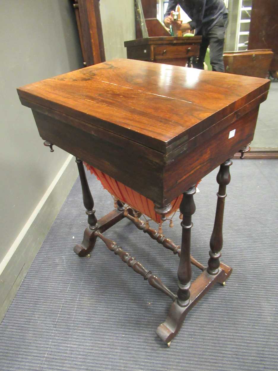 A 19th century inlaid rosewood games table, the fold over swivel top enclosing an inlaid - Image 3 of 10