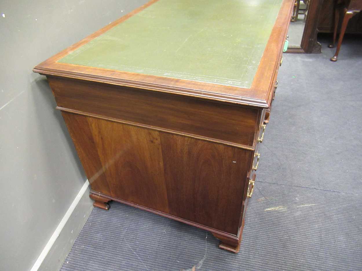 A George III style mahogany pedestal desk comprising of nine drawers on ogee bracket feet, 78 x - Image 5 of 5