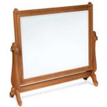 A large Cotswold School oak dressing table mirror,