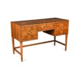 An English Art Deco parquetry decorated desk by Bath Cabinet Makers, circa 1925,