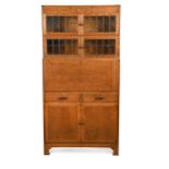 An Art Deco oak sectional bureau bookcase by Minty of Oxford,