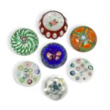 A collection of seven limited edition Perthshire glass paperweights,