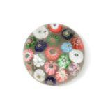 A Clichy spaced millefiori glass paperweight,