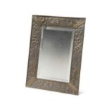 A Secessionist brass framed easel back mirror,