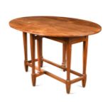 An Arts & Crafts oak drop-leaf dining table,