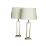 A pair of modern chrome table lamps,