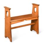 An Arts & Crafts oak hall bench,