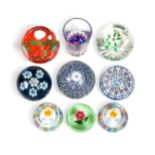 A collection of Perthshire glass paperweights,