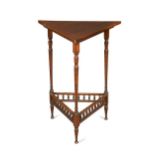 In the manner of E.W. Godwin, an Aesthetic period mahogany triangular occasional table,