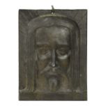 In the manner of Ivan Meštrović (1883-1962), a small lead plaque of Jesus Christ,