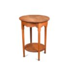 In the manner of William Birch, an Arts & Crafts oak occasional table,