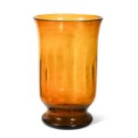In the manner of Whitefriars, a large amber glass hurricane lamp,
