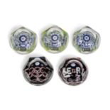 A collection of five limited edition Whitefriars faceted millefiori glass paperweights,