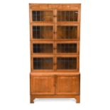 An Art Deco sectional oak bookcase by Minty of Oxford,